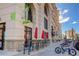 Ground level view of building's exterior and nearby amenities at 925 N Lincoln St # 14C, Denver, CO 80203