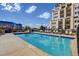 Inviting rooftop pool with city views and lounge chairs at 925 N Lincoln St # 14C, Denver, CO 80203
