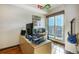 Bright home office with city views and built-in workspace at 925 N Lincoln St # 14C, Denver, CO 80203