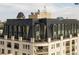 Exclusive rooftop view with arched windows and a terrace at 925 N Lincoln St # 14C, Denver, CO 80203
