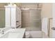 Clean bathroom with tub/shower combo and white vanity at 1150 Inca St # 27, Denver, CO 80204