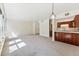 Open concept kitchen with modern appliances and a breakfast bar at 1150 Inca St # 27, Denver, CO 80204