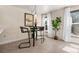 Breakfast nook with a bistro table and chairs, near the kitchen at 1150 Inca St # 27, Denver, CO 80204