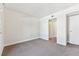 Well-lit bedroom with ample closet space and carpet at 1150 Inca St # 27, Denver, CO 80204