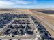 Aerial view of 109 Racer St, showcasing the neighborhood and surrounding landscape at 109 Racer St, Bennett, CO 80102