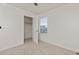 Small bedroom with closet and window at 109 Racer St, Bennett, CO 80102