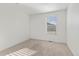 Bright and airy bedroom with carpeted floor and window coverings at 109 Racer St, Bennett, CO 80102