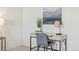 Well-lit home office with a desk and chair at 109 Racer St, Bennett, CO 80102
