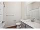 Clean bathroom with single vanity and bathtub at 487 Interlocken Blvd # 102, Broomfield, CO 80021