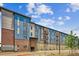 Modern apartment building with attached garages at 487 Interlocken Blvd # 102, Broomfield, CO 80021