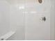 Spacious shower with a built-in seat and glass enclosure at 487 Interlocken Blvd # 102, Broomfield, CO 80021