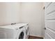 Laundry room with Whirlpool washer and dryer at 487 Interlocken Blvd # 102, Broomfield, CO 80021
