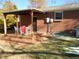 Deck and patio area with seating, next to the house at 12484 E Alaska Ave, Aurora, CO 80012