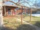 Brick home with a spacious backyard and wooden deck at 12484 E Alaska Ave, Aurora, CO 80012