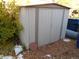 Metal storage shed in backyard, offering extra storage at 12484 E Alaska Ave, Aurora, CO 80012