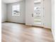 Bright entryway with light flooring and a modern white door at 3813 N Elk St, Aurora, CO 80019