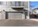 Attached garage with direct access to the unit and additional storage at 1223 S Wheeling Way, Aurora, CO 80012