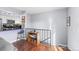 Modern kitchen with stainless steel appliances and a breakfast bar at 1223 S Wheeling Way, Aurora, CO 80012