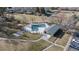 Community pool and recreation center with surrounding green space at 1223 S Wheeling Way, Aurora, CO 80012