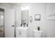 Updated bathroom with vanity, toilet, and modern fixtures at 1341 W 68Th Ave, Denver, CO 80221