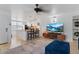 Living room, kitchen, and laundry area view at 5765 W Atlantic Pl # 104, Lakewood, CO 80227