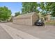 Attached garage with additional parking spaces at 5765 W Atlantic Pl # 104, Lakewood, CO 80227