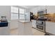 Well-equipped kitchen with granite countertops and stainless steel appliances at 5765 W Atlantic Pl # 104, Lakewood, CO 80227