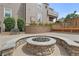 Stone firepit with seating in a community area at 5765 W Atlantic Pl # 104, Lakewood, CO 80227