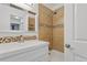Updated bathroom with a tub and shower combo at 5765 W Atlantic Pl # 104, Lakewood, CO 80227