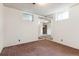 Basement bedroom with mirrored walls and neutral carpeting at 7886 Cyd Dr, Denver, CO 80221