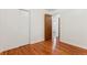 Bedroom featuring hardwood floors and double closets at 7886 Cyd Dr, Denver, CO 80221