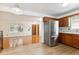 View of kitchen and living room with hardwood floors at 7886 Cyd Dr, Denver, CO 80221
