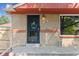 Front entrance with decorative security door at 7886 Cyd Dr, Denver, CO 80221