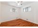 Bedroom with hardwood floors and ceiling fan at 7886 Cyd Dr, Denver, CO 80221