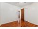 Bright bedroom with hardwood floors and ample closet space at 7886 Cyd Dr, Denver, CO 80221