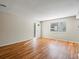 Bright living room featuring hardwood floors and lots of natural light at 1250 S Monaco Pkwy # 2, Denver, CO 80224