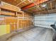 Attached garage with pegboard and ample storage space at 1250 S Monaco Pkwy # 2, Denver, CO 80224