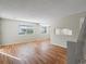 Bright and spacious living room with hardwood flooring at 1250 S Monaco Pkwy # 2, Denver, CO 80224