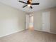 Spacious bedroom with ceiling fan and carpeting at 1250 S Monaco Pkwy # 2, Denver, CO 80224