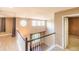 Open view of the second floor hallway with access to rooms below at 3893 Mallard St, Highlands Ranch, CO 80126