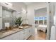 Modern bathroom with double vanity and walk-in shower at 3907 Piney Grove St, Evergreen, CO 80439