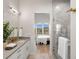 Spa-like bathroom with a walk-in shower and bedroom view at 3907 Piney Grove St, Evergreen, CO 80439