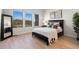 Spacious bedroom with large windows and mountain views at 3907 Piney Grove St, Evergreen, CO 80439