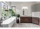 Bathroom with soaking tub and double vanity at 5123 Quaker St, Golden, CO 80403