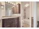 Bathroom with a shower/tub combo, vanity, and tiled floors at 955 Eudora St # 101E, Denver, CO 80220