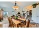 Bright dining room with hardwood floors and view to backyard at 2551 S Flanders Ct, Aurora, CO 80013