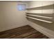 Finished basement storage area with built-in shelving at 2725 E 97Th Ave, Denver, CO 80229