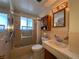 Clean bathroom with shower/tub combo and updated vanity at 950 S Potomac Ct, Aurora, CO 80012