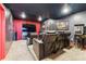 Finished basement home theater with comfortable seating and large screen at 8551 Orchard Way, Arvada, CO 80007