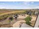 Elevated view of backyard patio with fire pit and seating area at 8551 Orchard Way, Arvada, CO 80007